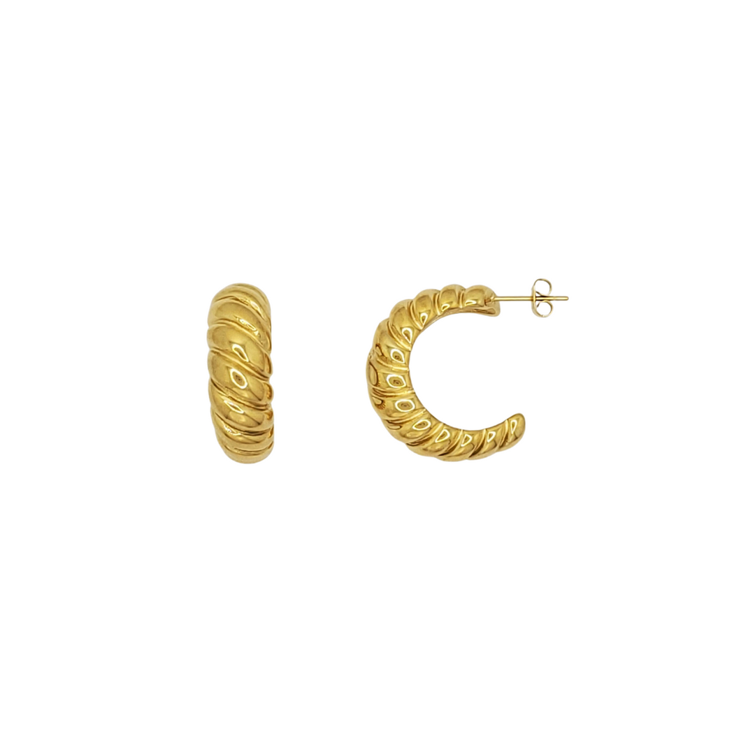 Add a touch of French delicacy to your everyday jewelry collection with these playful hoops. These earrings feature a classic spiral dome, inspired by the iconic French pastry. The perfect gift for yourself or a special someone in your life.