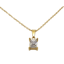 Load image into Gallery viewer, This emerald cut solitaire pendant necklace is truly a classic design. With a maximum sparkle, the gemstone is the centerpiece of our Gemma Necklace. With its simple approach, this piece adds instant elegance to any outfit.
