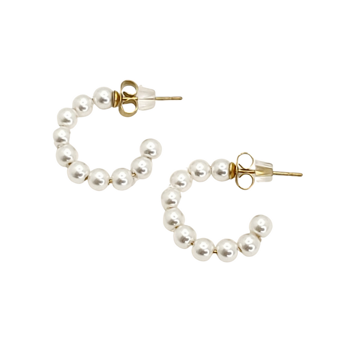 Hoop earrings are a classic accessory that can be worn everyday and dressed up or down. These mini pearl hoop earrings are a must-have for any jewelry collection, with their chic, clean look and pearls. Perfect for everyday wear or for when you need to step up your style just a bit more!