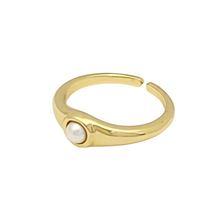 Load image into Gallery viewer, The Rosalie Ring is the epitome of effortless yet elevated jewelry. The subtly detailed, refined and ladylike pearl gives our Rosalie Ring an elegant look that goes with everything. This simple pearl ring is sure to become a favorite you reach for when you want to look effortlessly chic.
